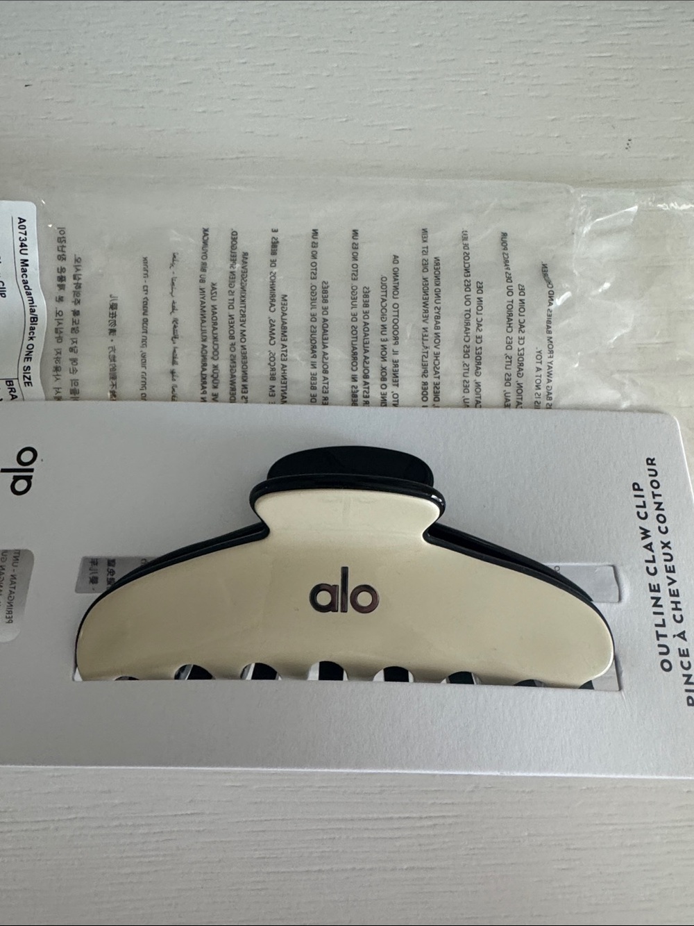 Outline Claw Hair Clip in Macadamia with Black Trim Alo Yoga